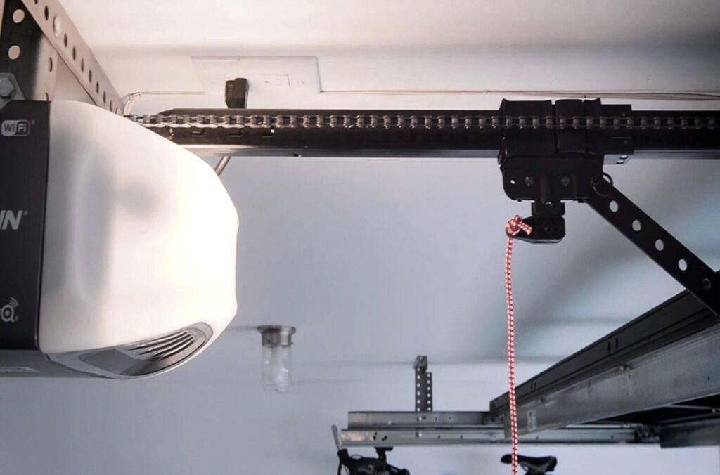 garage door won’t open but motor runs opener system